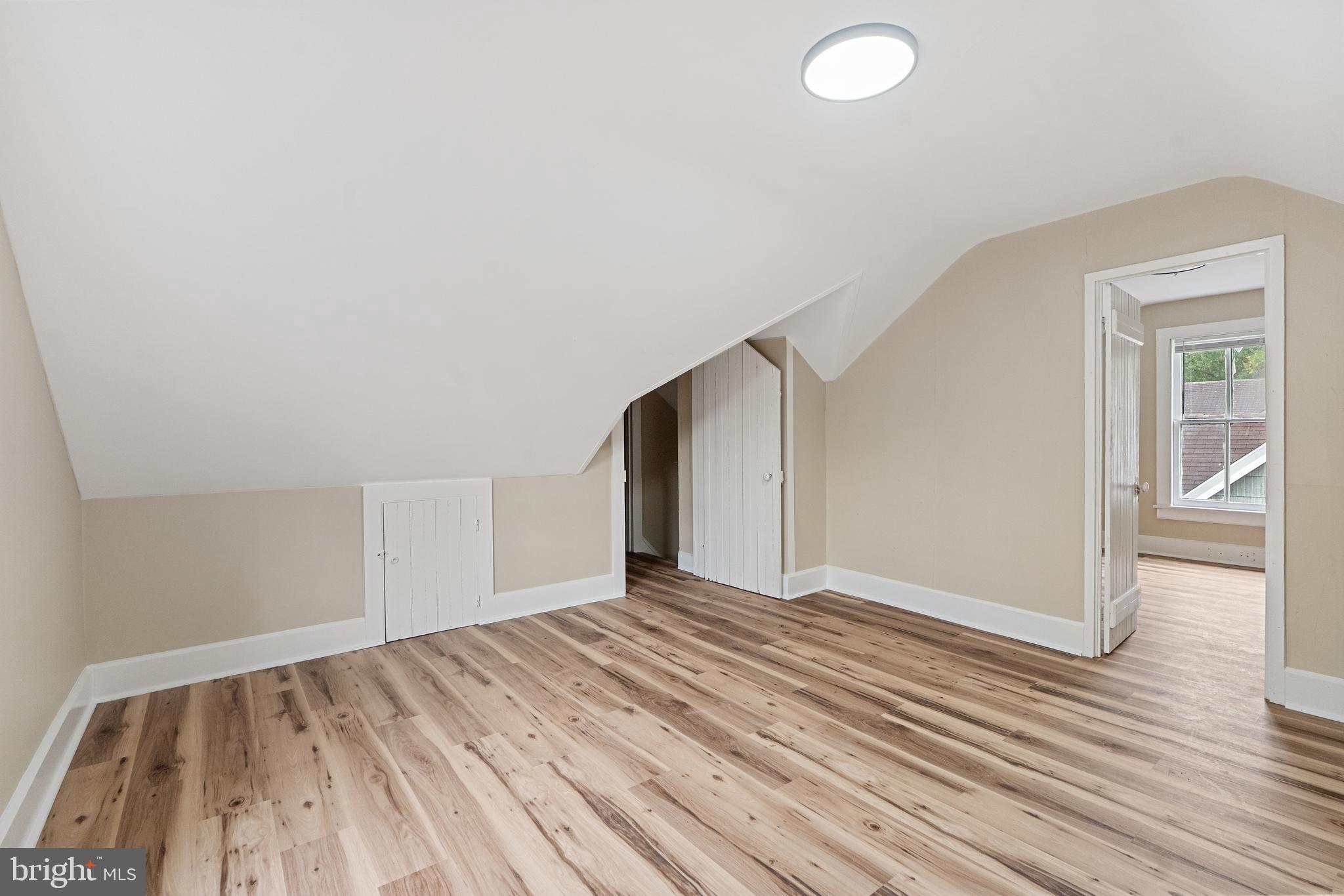 154 7th Street Salem, NJ 08079 - Photo 34 of 48 a view of a big room with wooden floor and windows