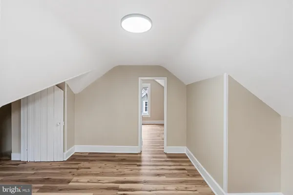 a view of a livingroom with wooden floor