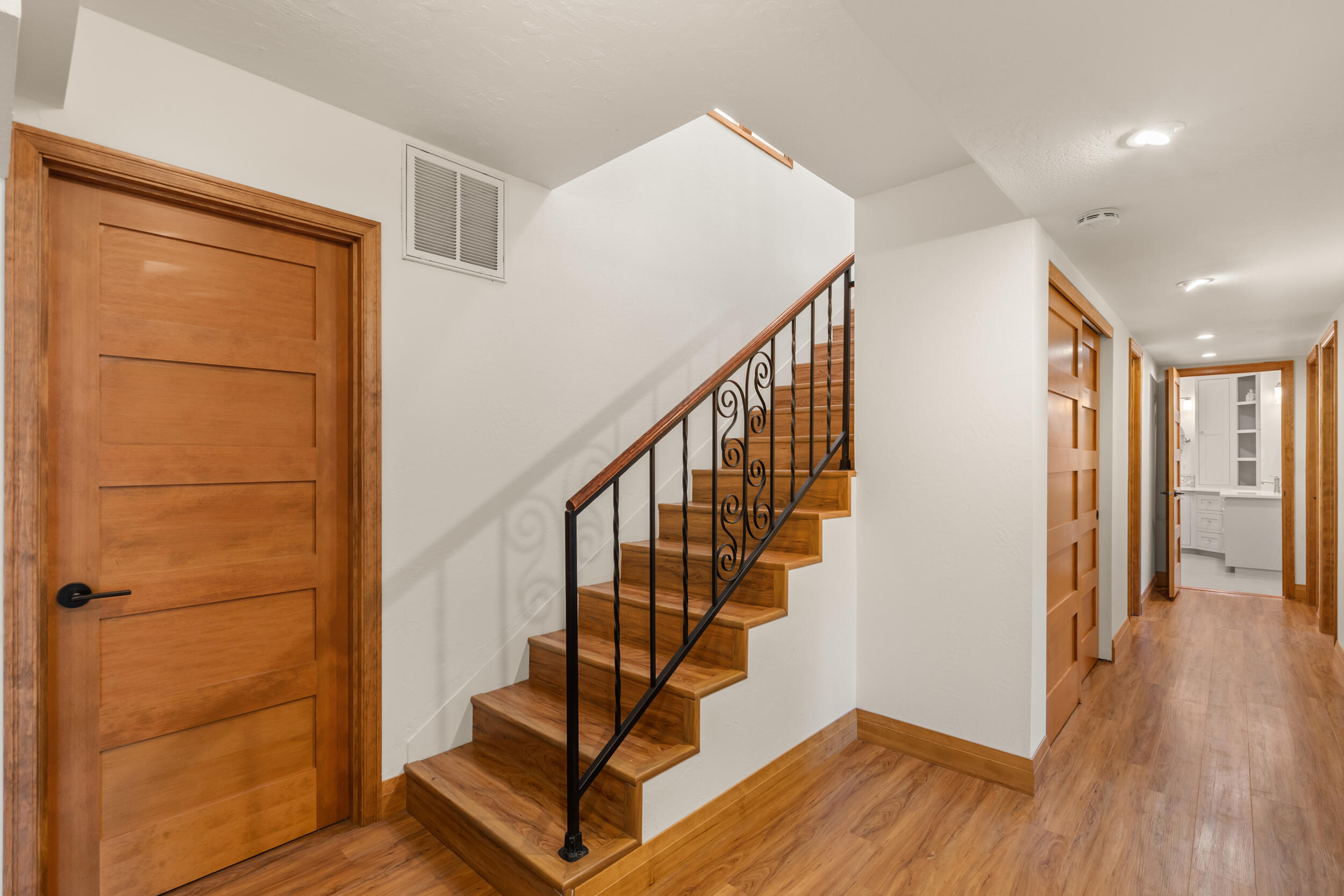 3583 Ross Lane Central Point, OR 97502 - Photo 15 of 52 a view of entryway with wooden floor and stairs