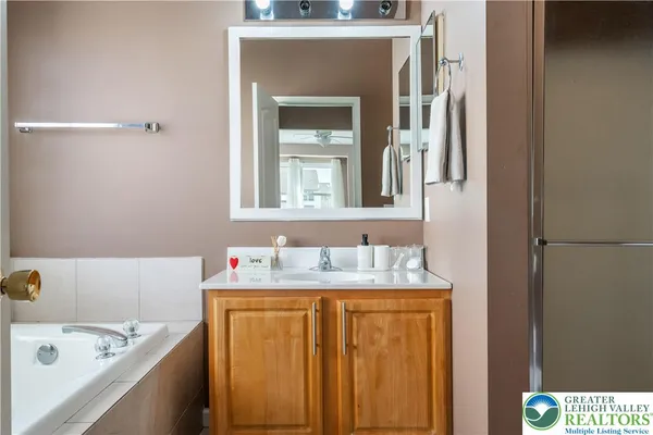 a bathroom with a sink and a bathtub