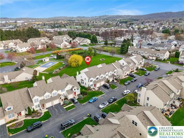 an aerial view of a city with lots of residential buildings