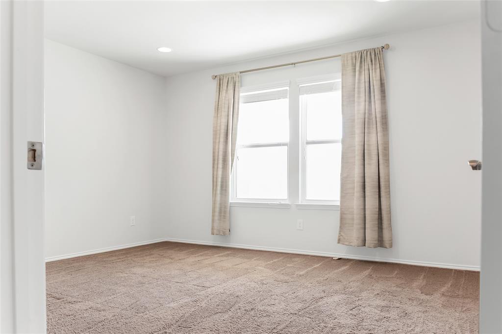 7793 Gulf Walk Road Frisco, TX 75036 - Photo 26 of 37 an empty room with a window