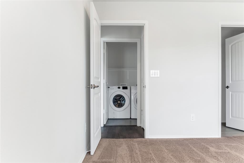 7793 Gulf Walk Road Frisco, TX 75036 - Photo 29 of 37 a view of a hallway with wooden floor