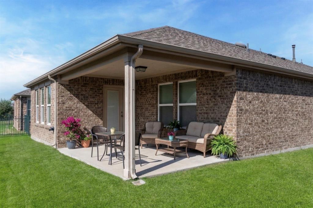 7793 Gulf Walk Road Frisco, TX 75036 - Photo 35 of 37 a view of house with backyard