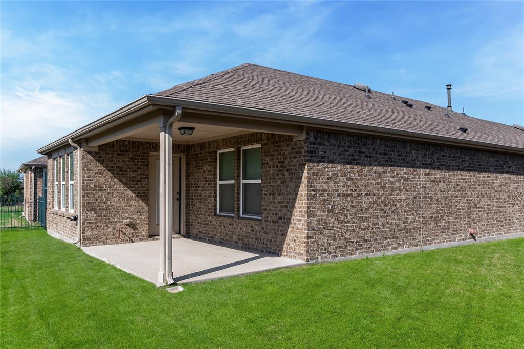 7793 Gulf Walk Road Frisco, TX 75036 - Photo 36 of 37 a view of a house with a yard