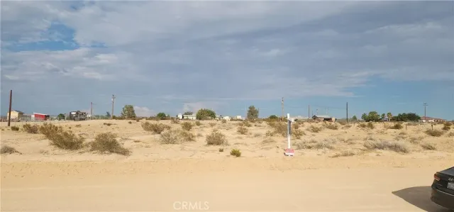 a view of ocean view with snow on the background