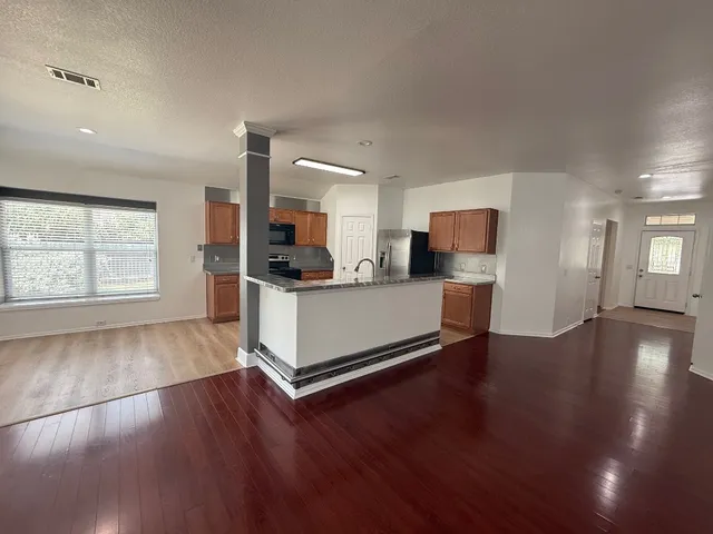 a view of backyard with outdoor seating