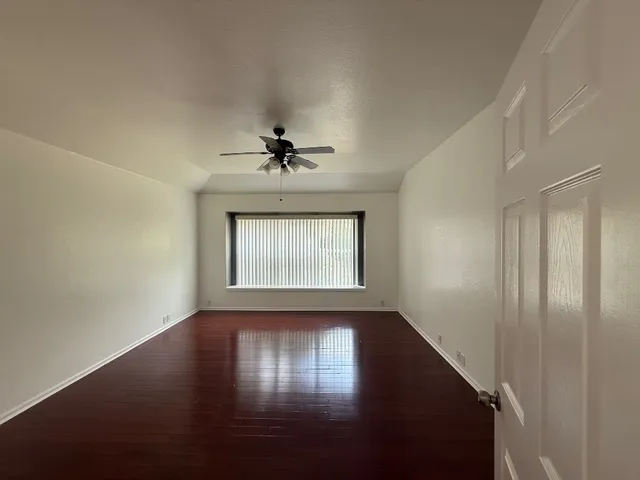 a kitchen with stainless steel appliances granite countertop a stove top oven a sink a counter space and cabinets