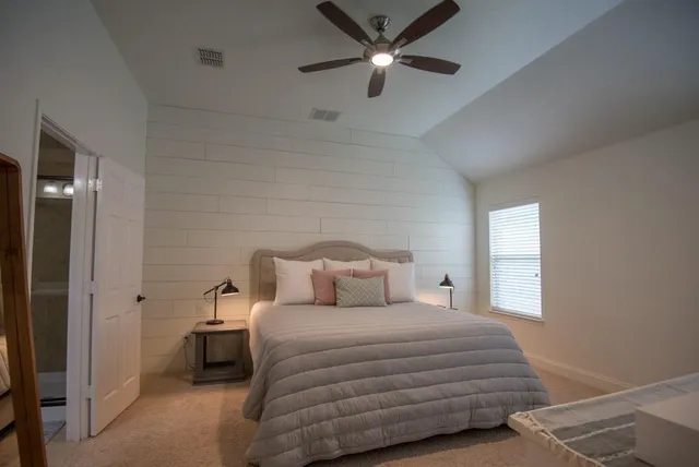a bathroom with a sink a tub and a mirror