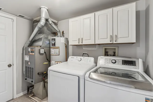 a view of a storage & utility room with a window