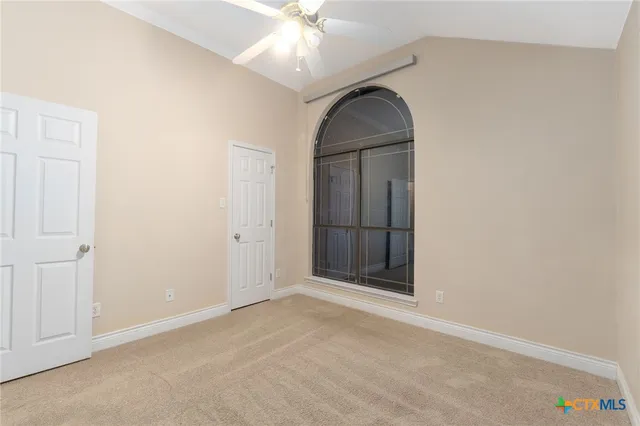 an empty room with windows