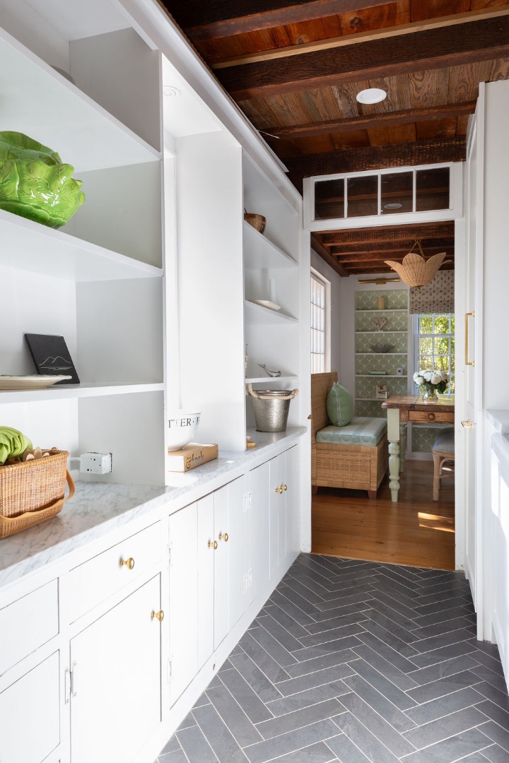 24 Milk Street Nantucket, MA 02554 - Photo 13 of 39 a kitchen with a refrigerator and a sink