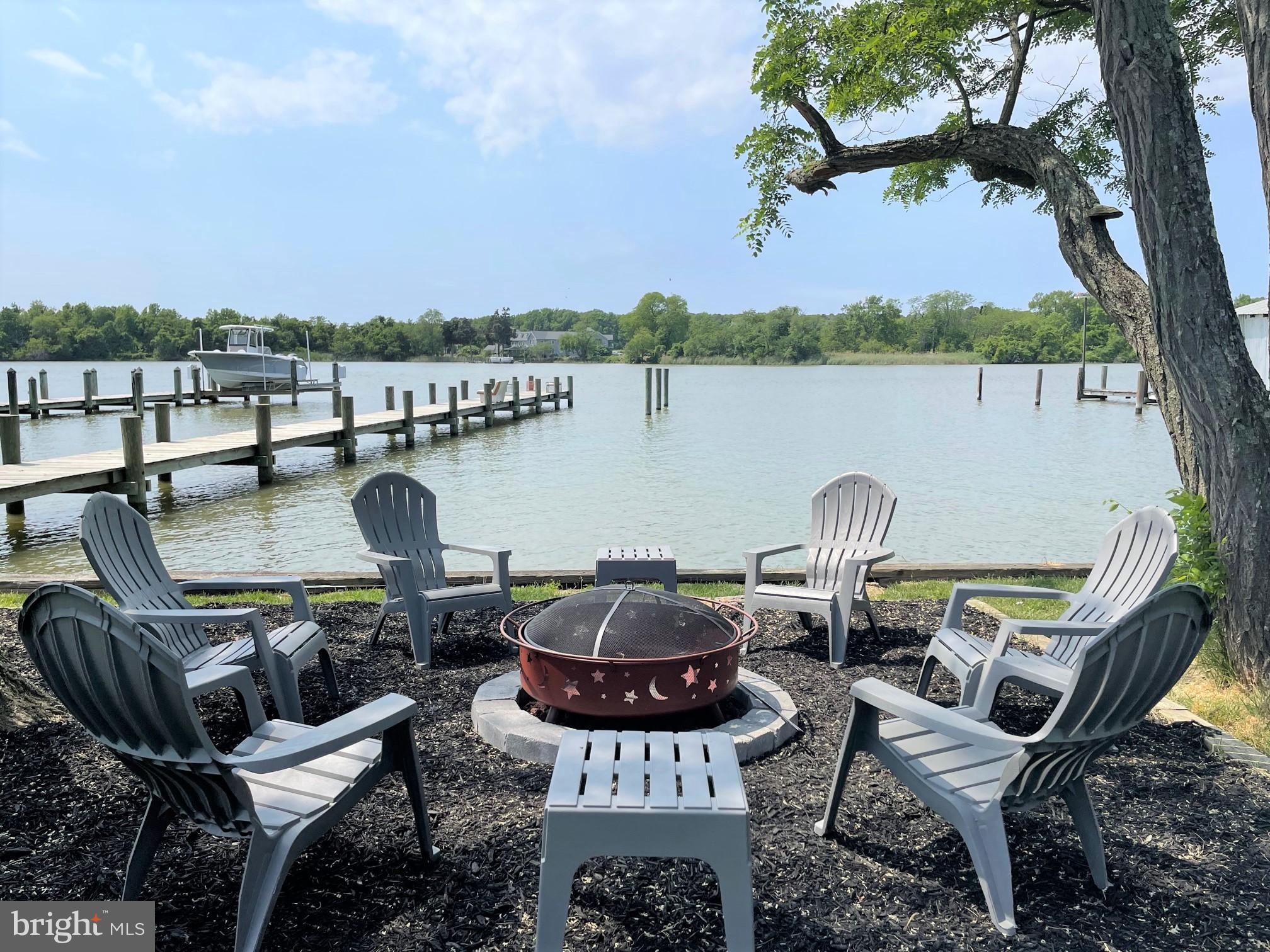 Water front on Cox Creek with fire pit.