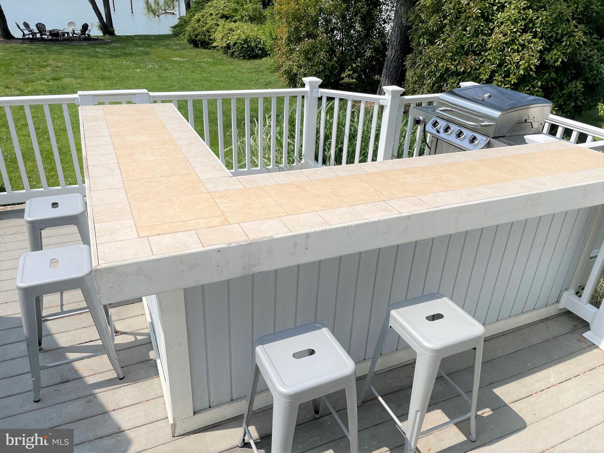 226 Bentons Pleasure Road Chester, MD 21619 - Photo 21 of 45 Inviting outdoor bar for summer gatherings.