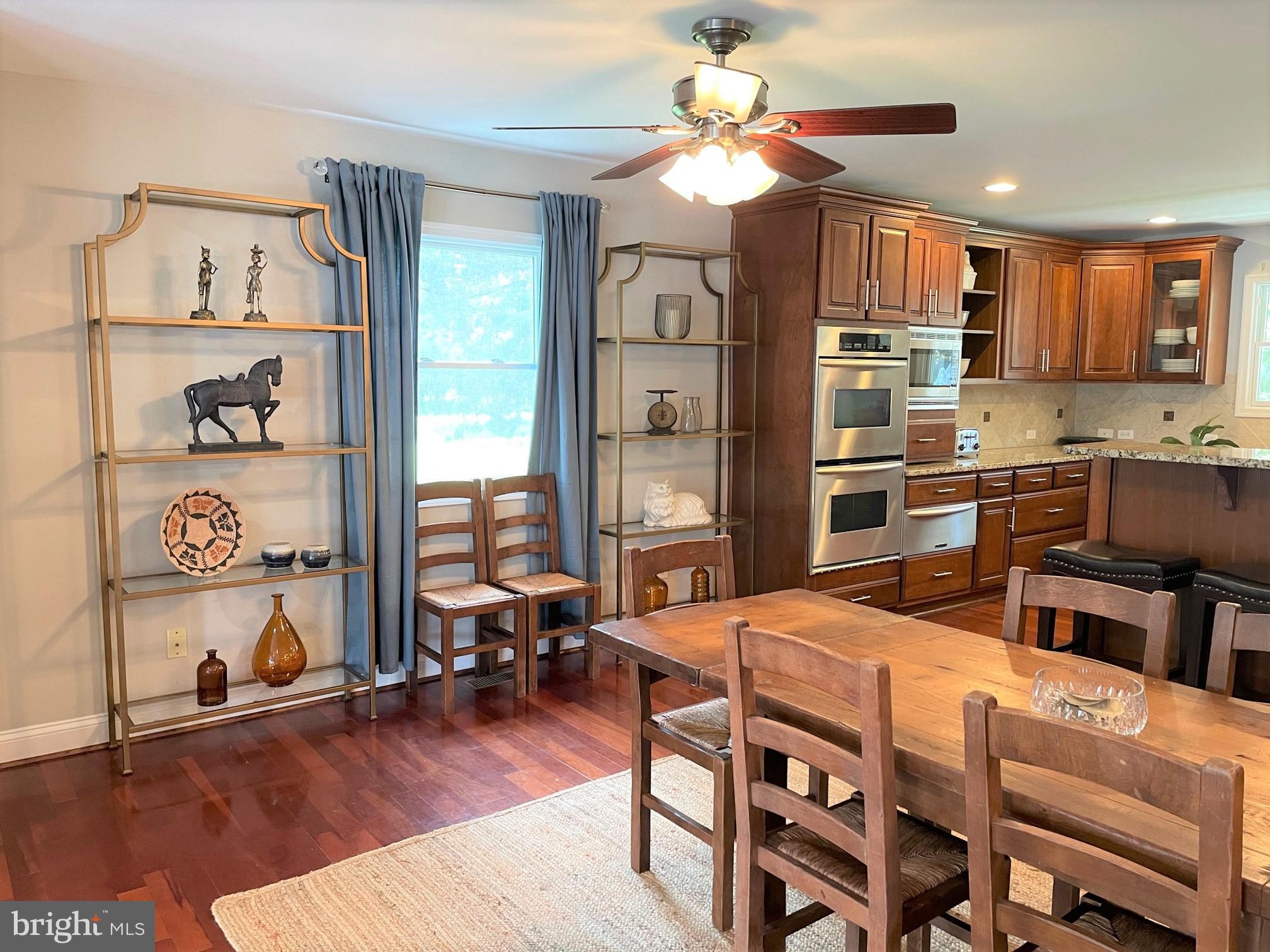 226 Bentons Pleasure Road Chester, MD 21619 - Photo 10 of 45 Inviting kitchen with warm wooden accents.