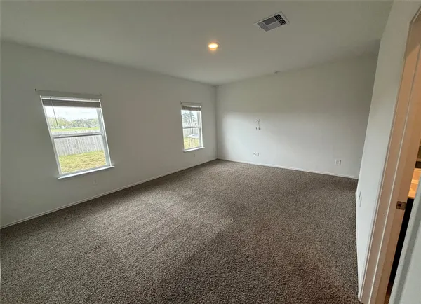 a bathroom with a double vanity sink and mirror