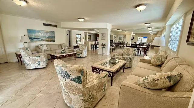 a kitchen with stainless steel appliances a stove a sink and a refrigerator