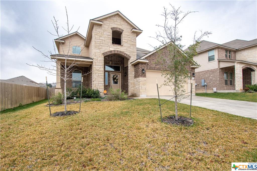 a house view with a outdoor space
