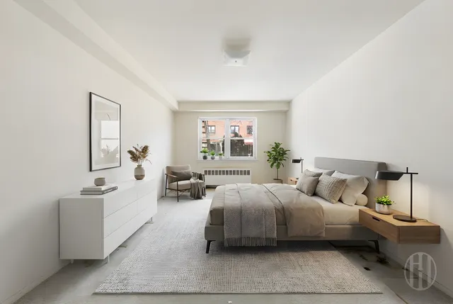 a hotel room with two beds and a couch