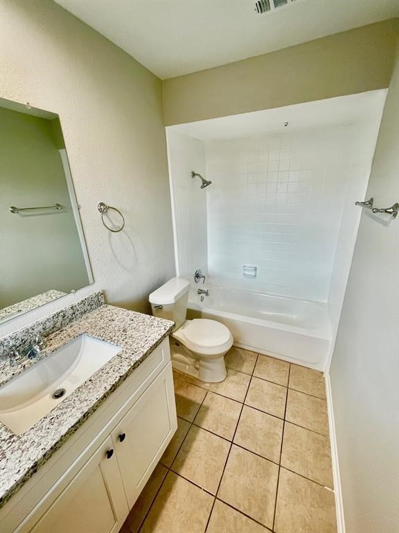 7700 Creekbend Drive, Unit 72 Houston, TX 77071 - Photo 14 of 21 a bathroom with a granite countertop sink toilet and shower