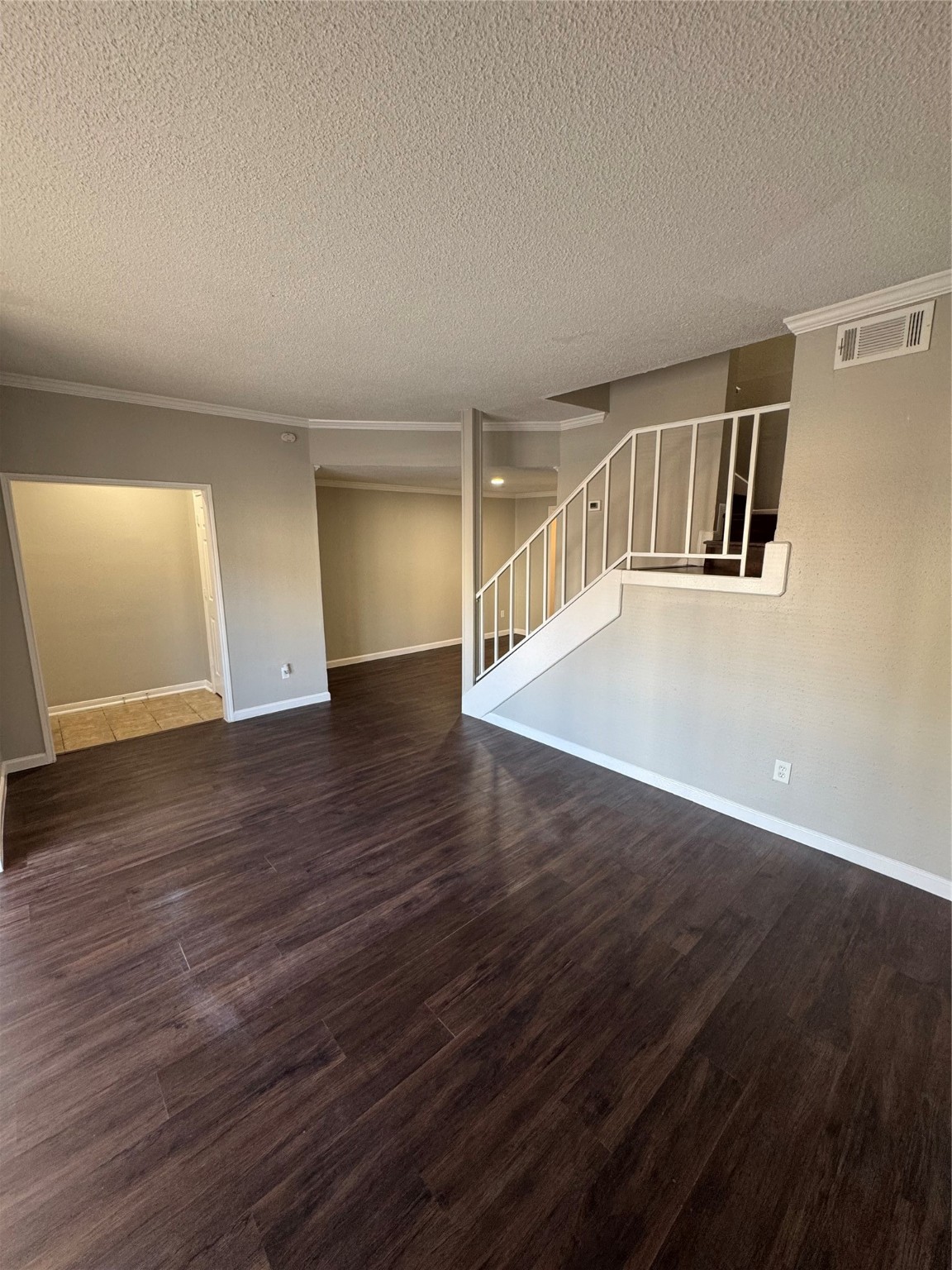 7700 Creekbend Drive, Unit 72 Houston, TX 77071 - Photo 5 of 21 a view of an empty room with wooden floor