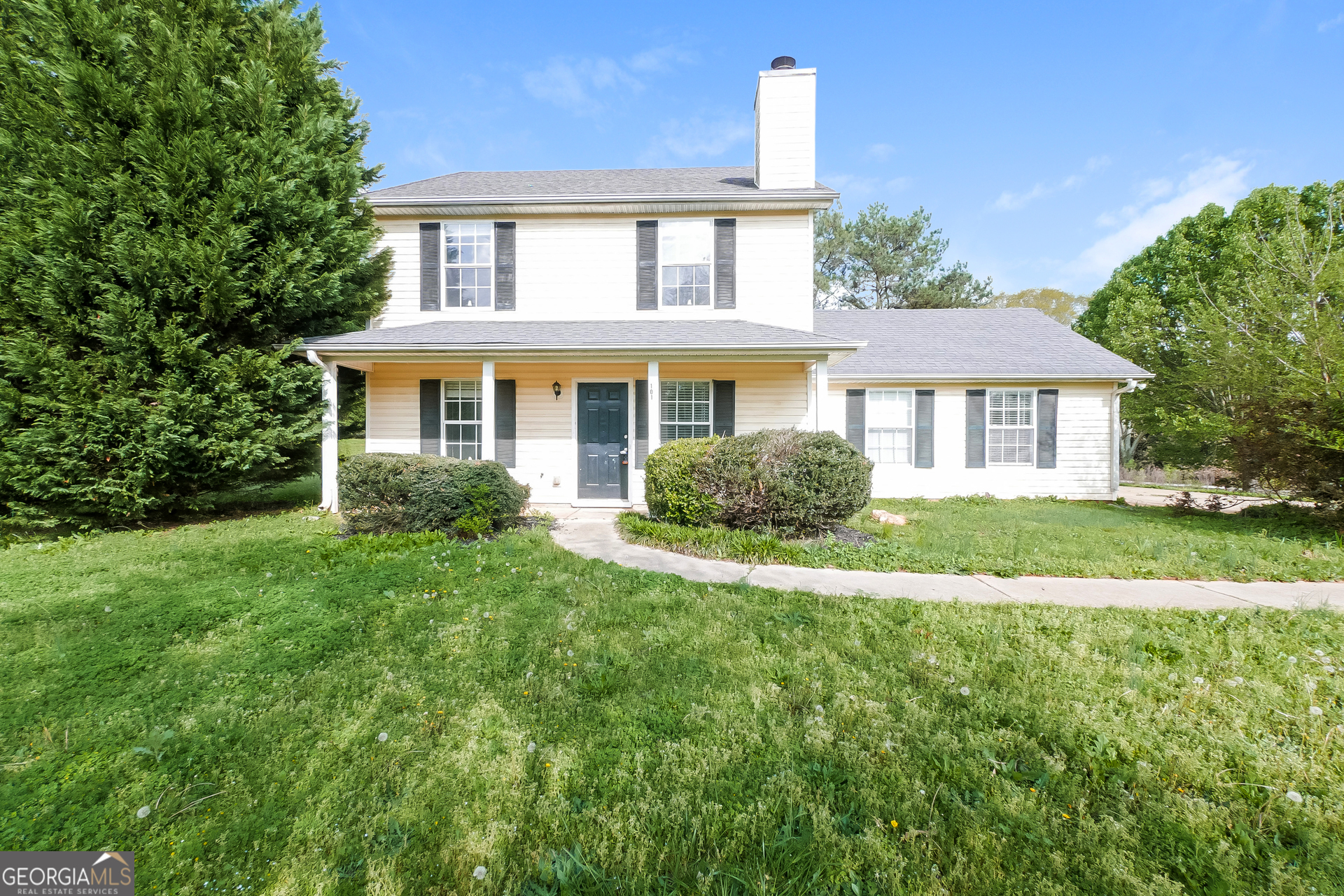 101 Bradesbury Lane Locust Grove, GA 30248 - Photo 1 of 17 a front view of a house with a yard
