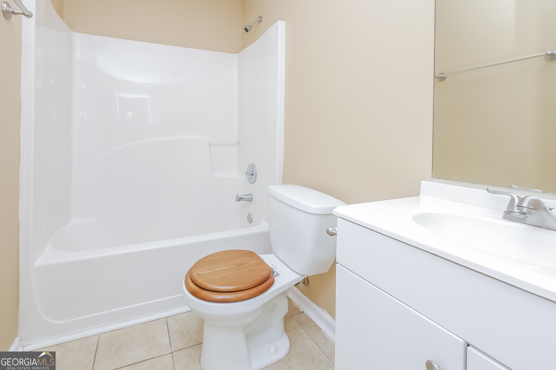 101 Bradesbury Lane Locust Grove, GA 30248 - Photo 14 of 17 a bathroom with a sink a toilet and a bathtub