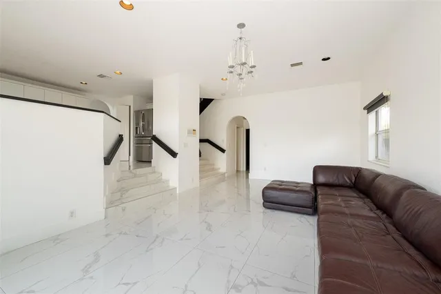 a utility room with sink dryer and washer