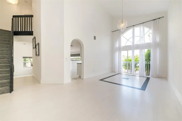 a kitchen with a sink cabinets and appliances