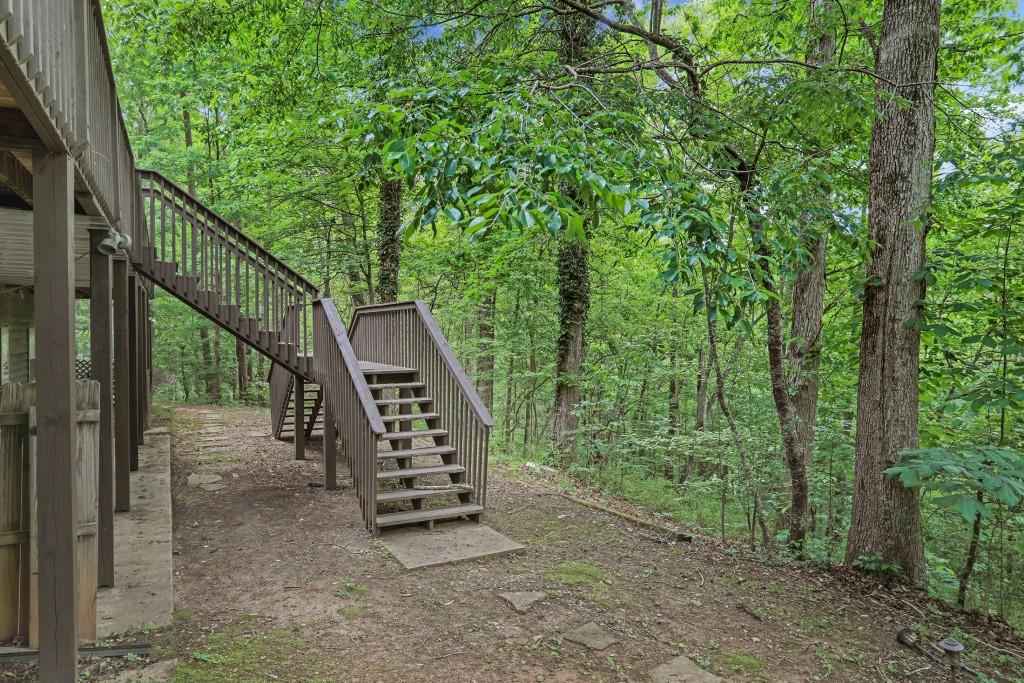 101 Yellow Bluff Road Dahlonega, GA 30533 - Photo 6 of 20 a view of a deck with a backyard
