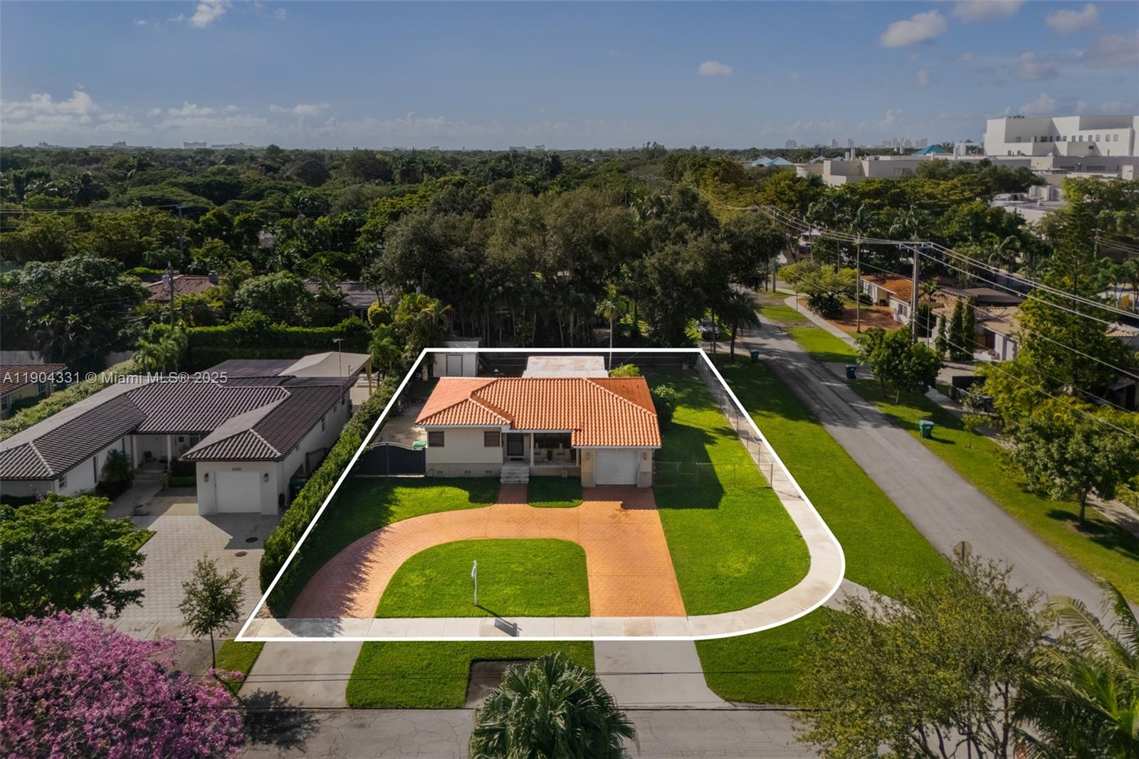 6040 Southwest 29th Street Miami, FL 33155 - Photo 2 of 18 an aerial view of residential houses with outdoor space and lake view