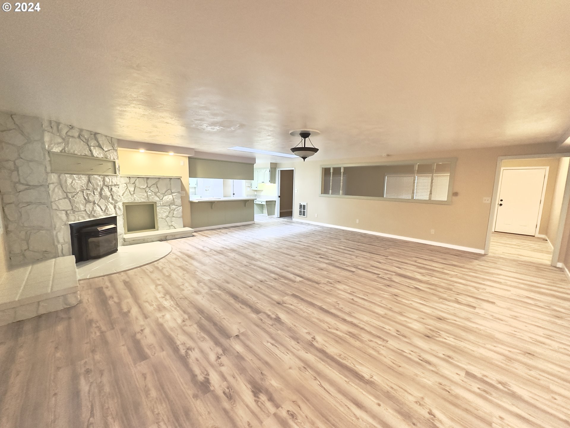 2160 Pioneer Road Dallas, OR 97338 - Photo 5 of 22 a view of a livingroom with kitchen and furniture