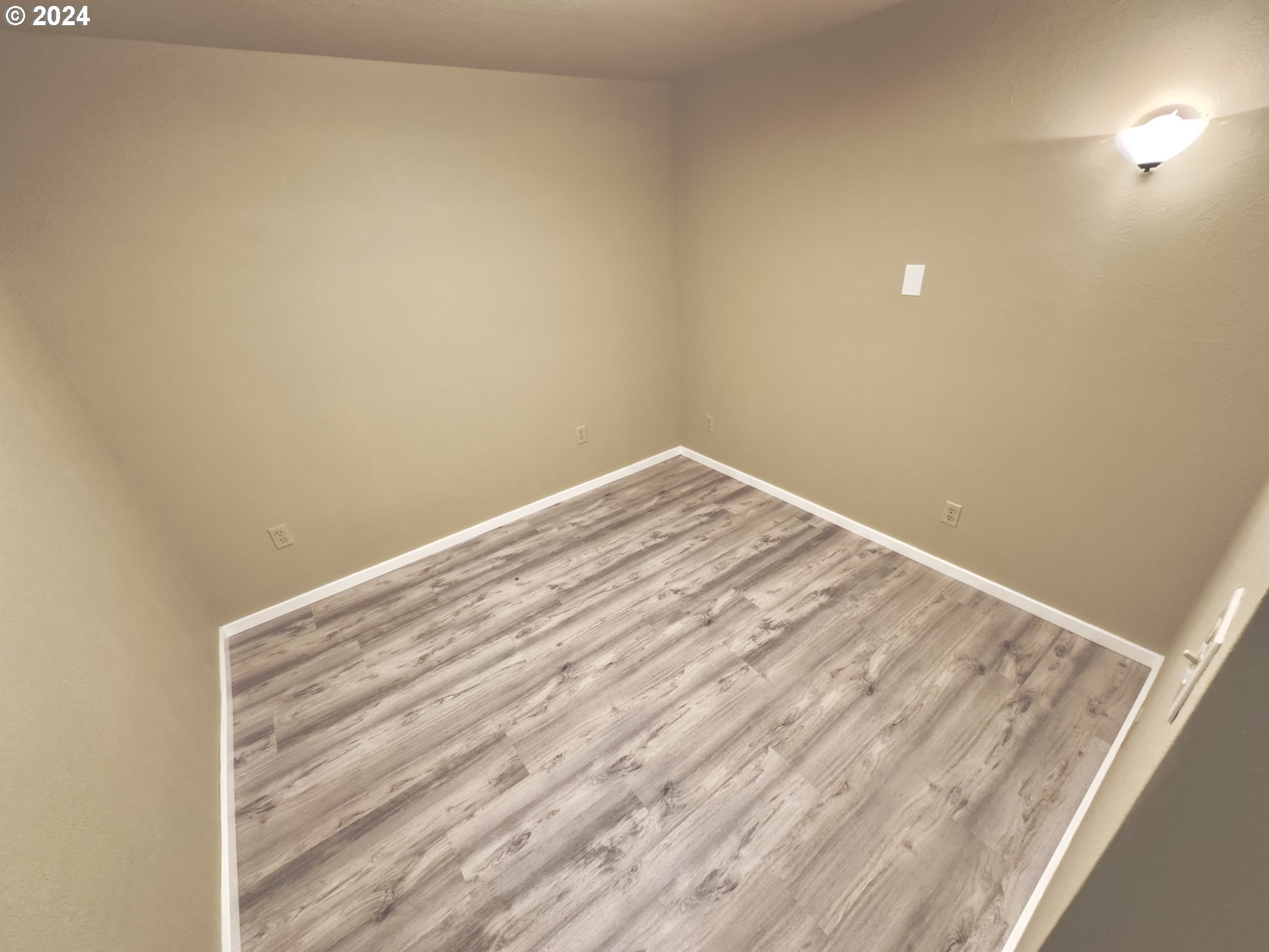 2160 Pioneer Road Dallas, OR 97338 - Photo 8 of 22 a view of empty room with wooden floor