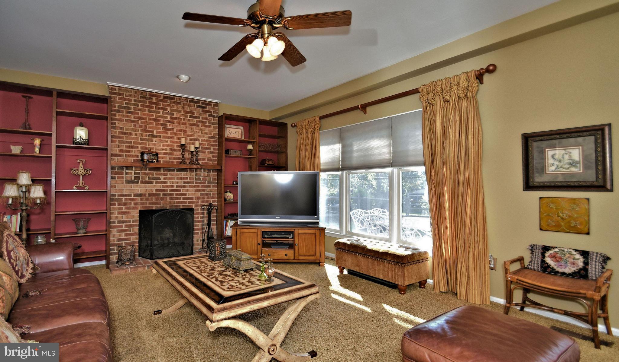 46 Heather Valley Road Holland, PA 18966 - Photo 17 of 35 family room/fireplace