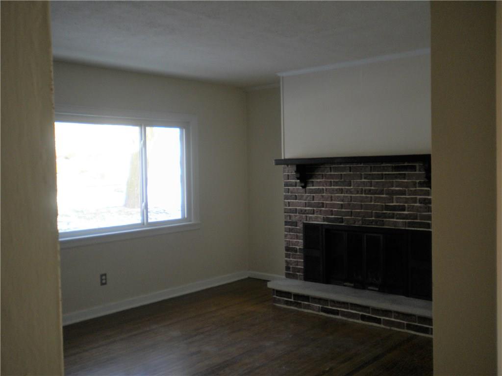 1538 Bakerstown Road Tarentum, PA 15084 - Photo 7 of 19 living room with fireplace