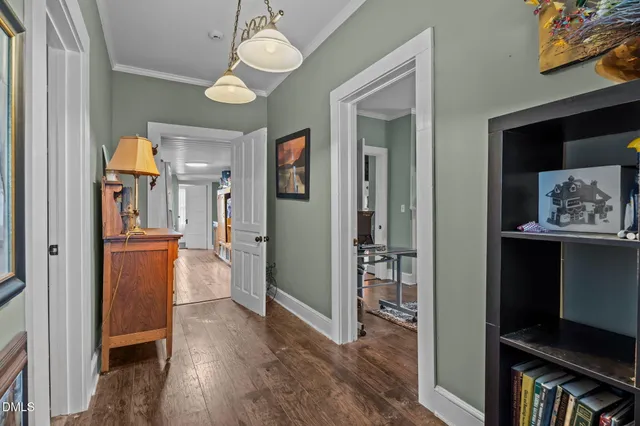 a kitchen with stainless steel appliances granite countertop a sink and a refrigerator