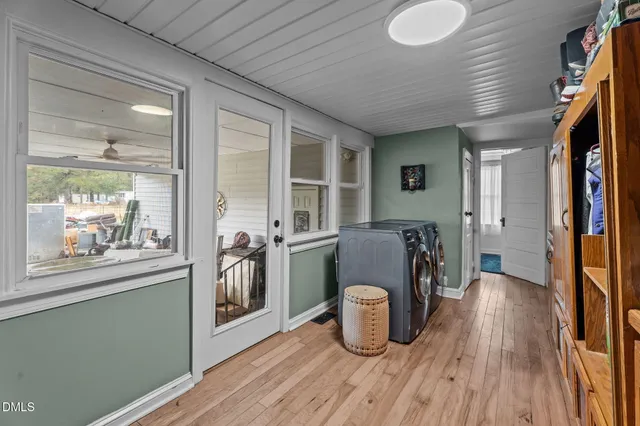 a kitchen with stainless steel appliances granite countertop a sink refrigerator and stove