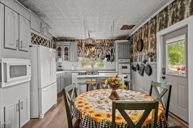 a view of a workspace with furniture