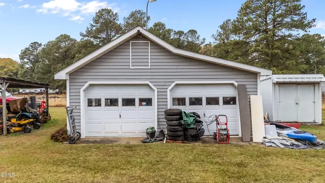 a view of a swimming pool with a yard