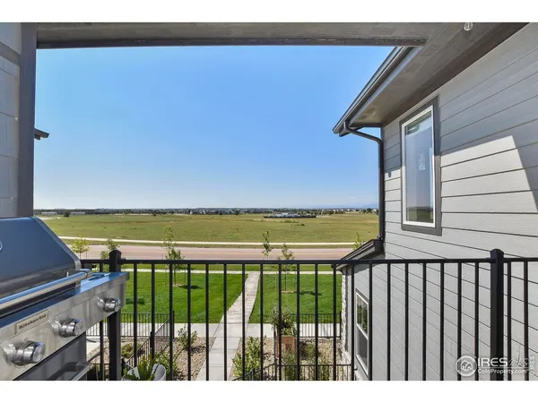 a view of a balcony with an outdoor space