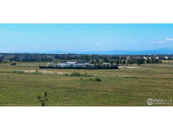 a view of an ocean and city