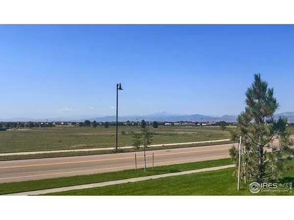 a view of an ocean and city