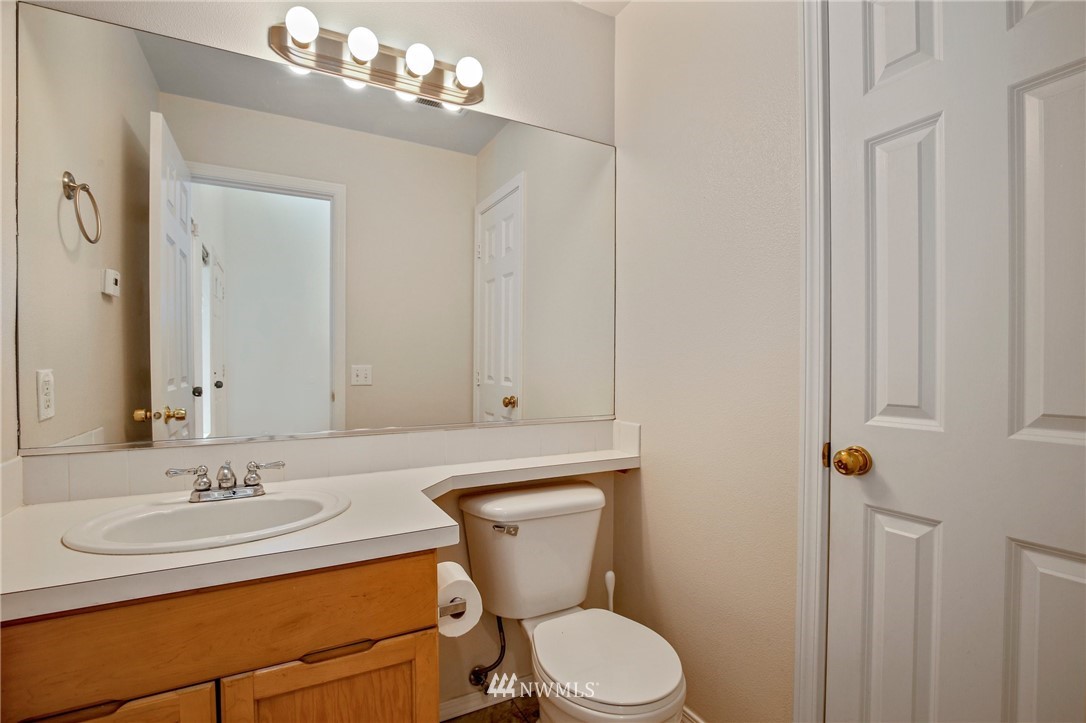 19131 110th Place Southeast Renton, WA 98055 - Photo 13 of 25 a bathroom with a sink toilet and shower