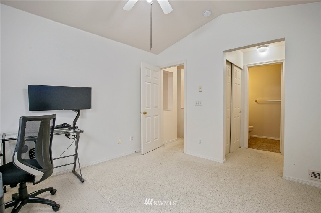19131 110th Place Southeast Renton, WA 98055 - Photo 14 of 25 a view of room with workspace and mirror