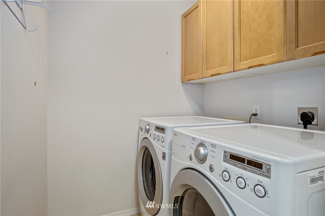 19131 110th Place Southeast Renton, WA 98055 - Photo 20 of 25 a utility room with dryer and washer