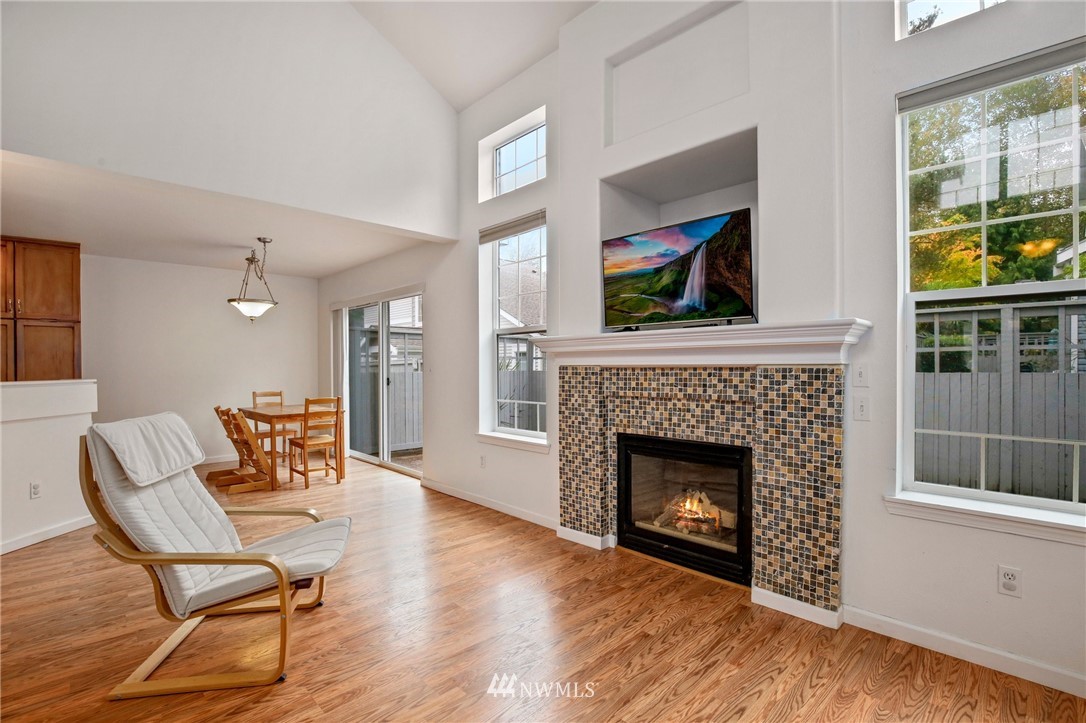 19131 110th Place Southeast Renton, WA 98055 - Photo 5 of 25 a living room with furniture and a fireplace