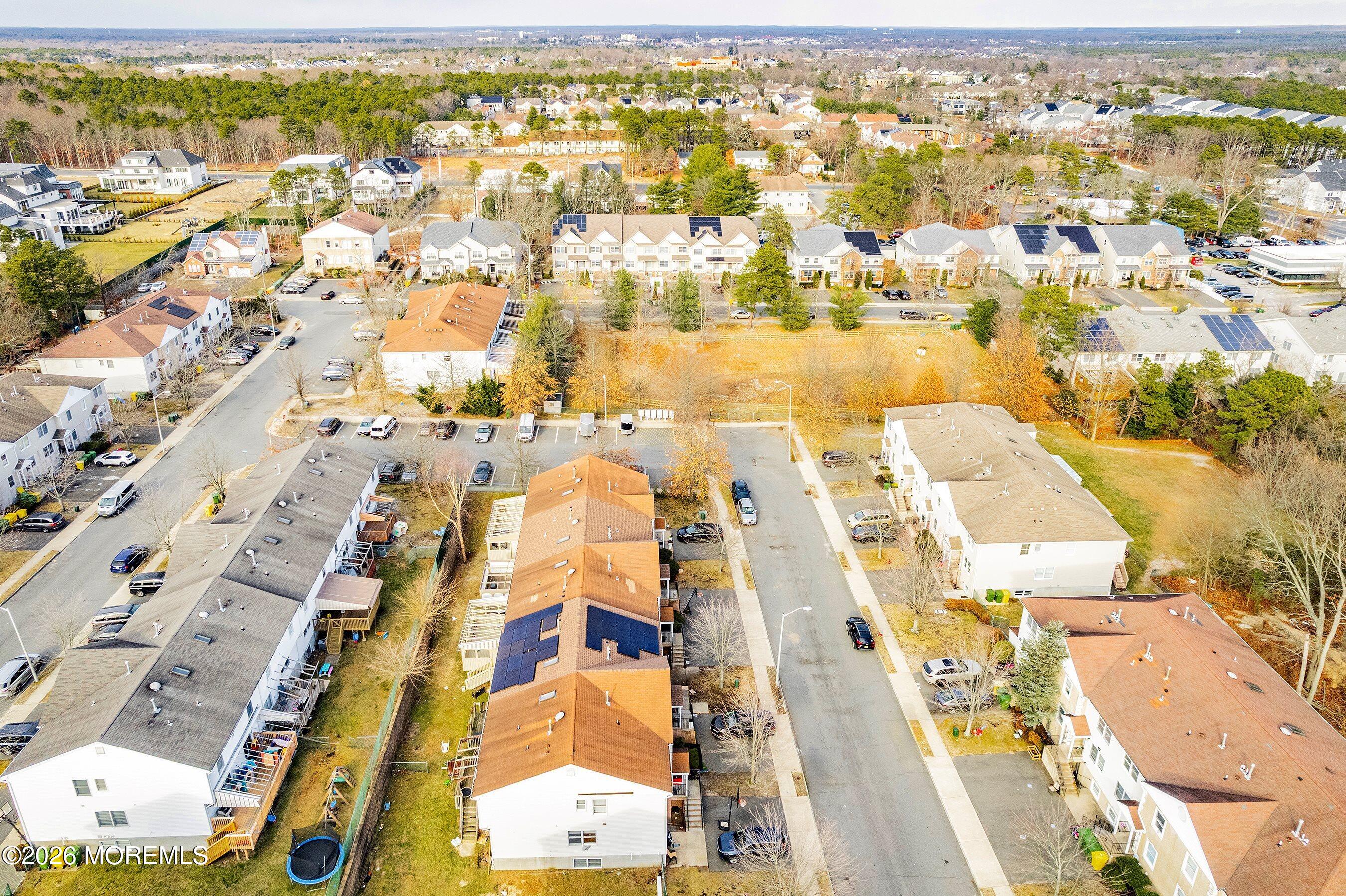 116 Ricky Lane Lakewood, NJ 08701 - Photo 12 of 15 an aerial view of residential building and parking space