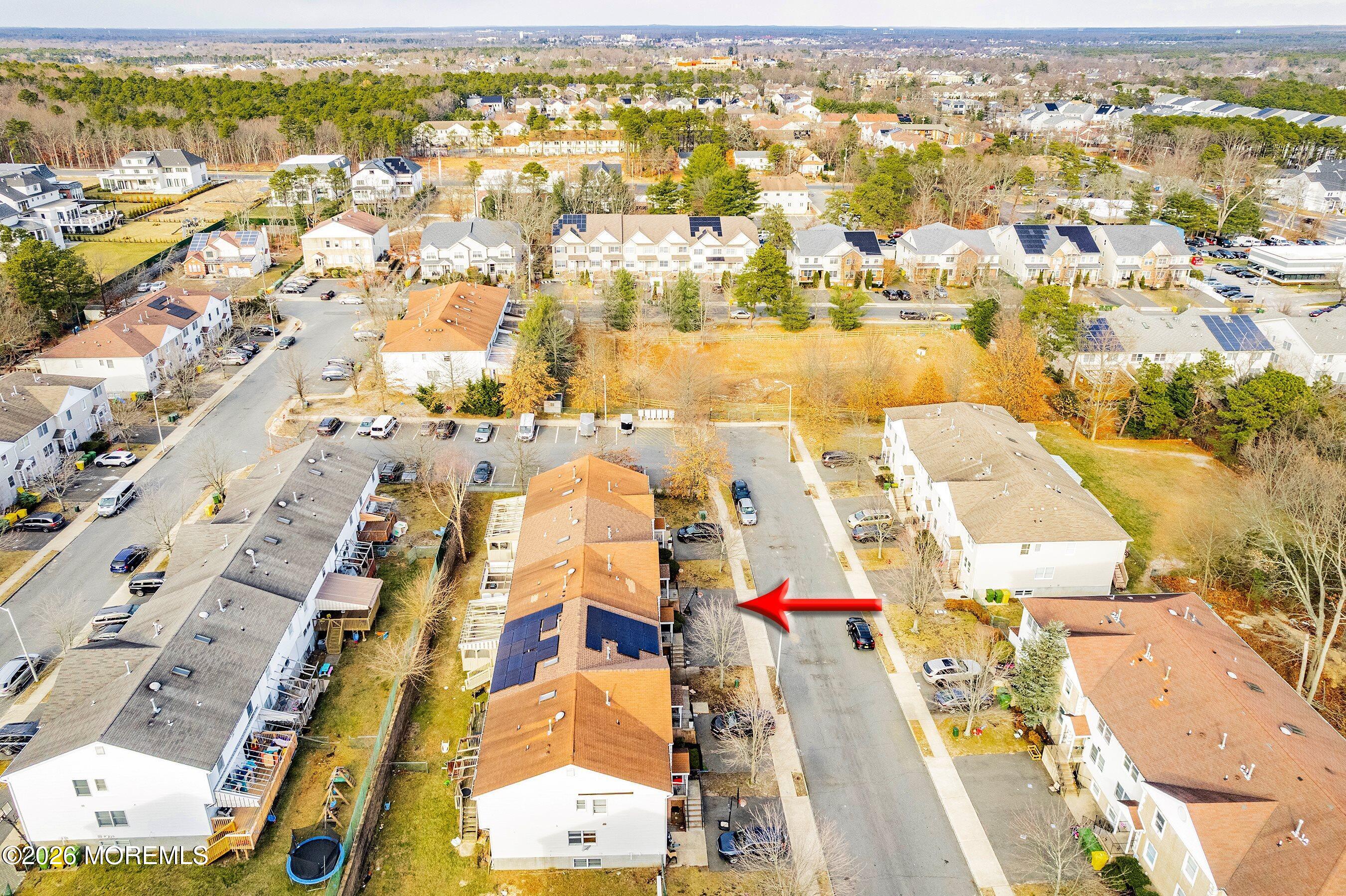 116 Ricky Lane Lakewood, NJ 08701 - Photo 13 of 15 an aerial view of residential building and parking space