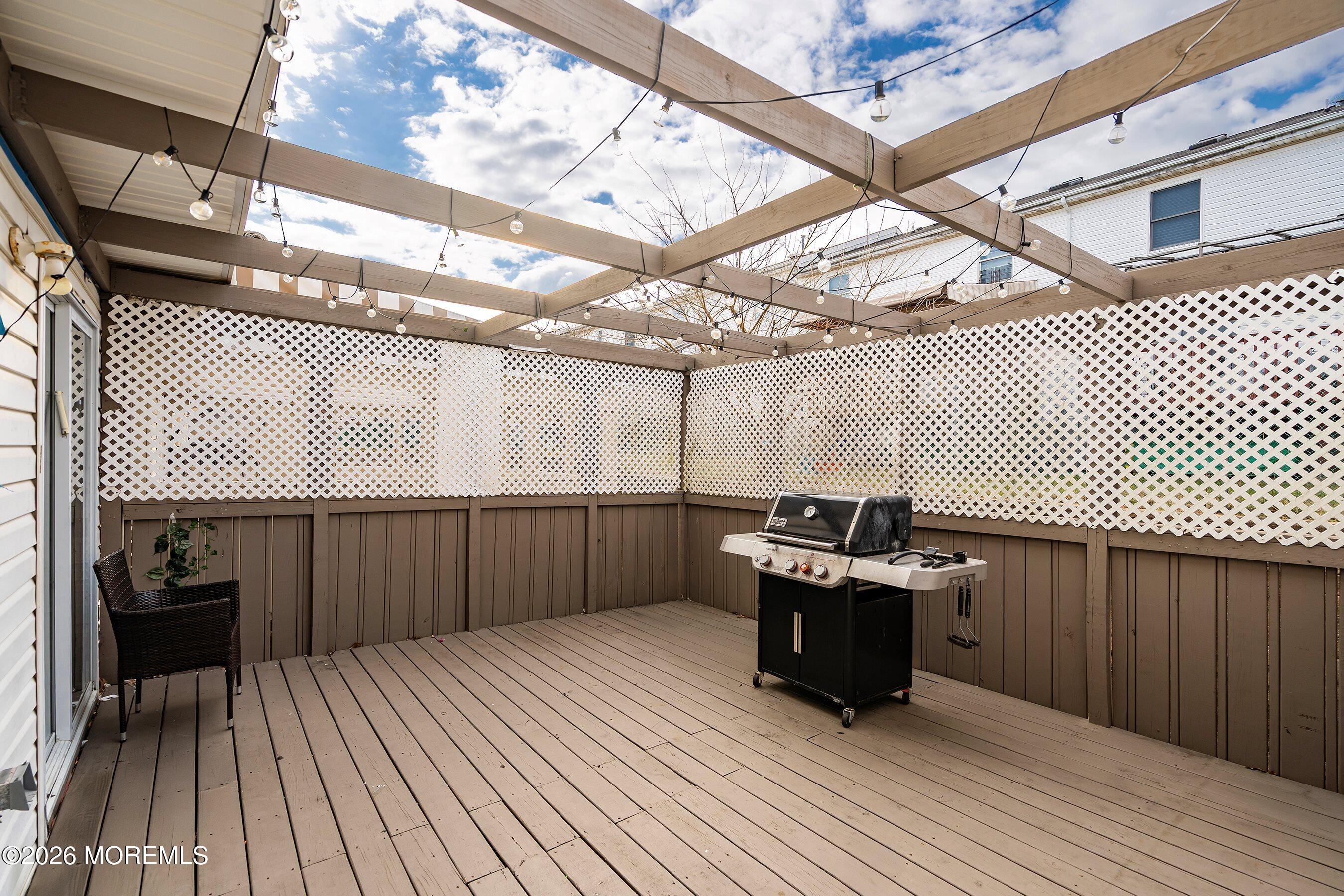 116 Ricky Lane Lakewood, NJ 08701 - Photo 5 of 15 a view of a deck with wooden floor