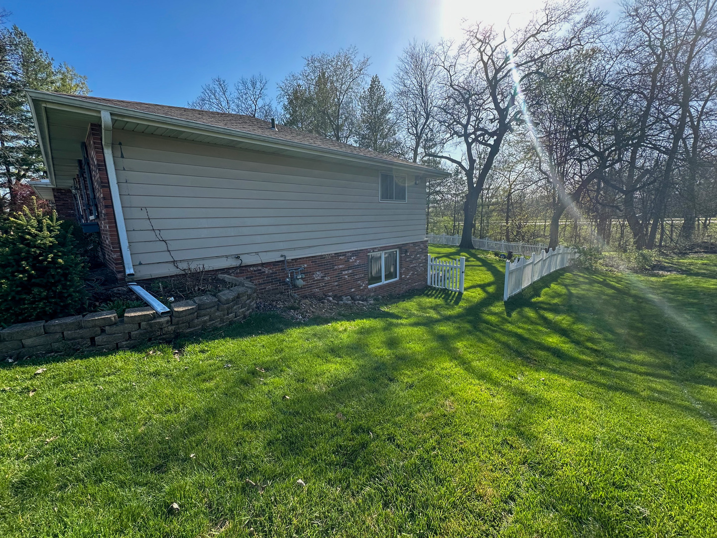 6315 North Post Oak Road Peoria, IL 61615 - Photo 2 of 31 a view of back yard of the house